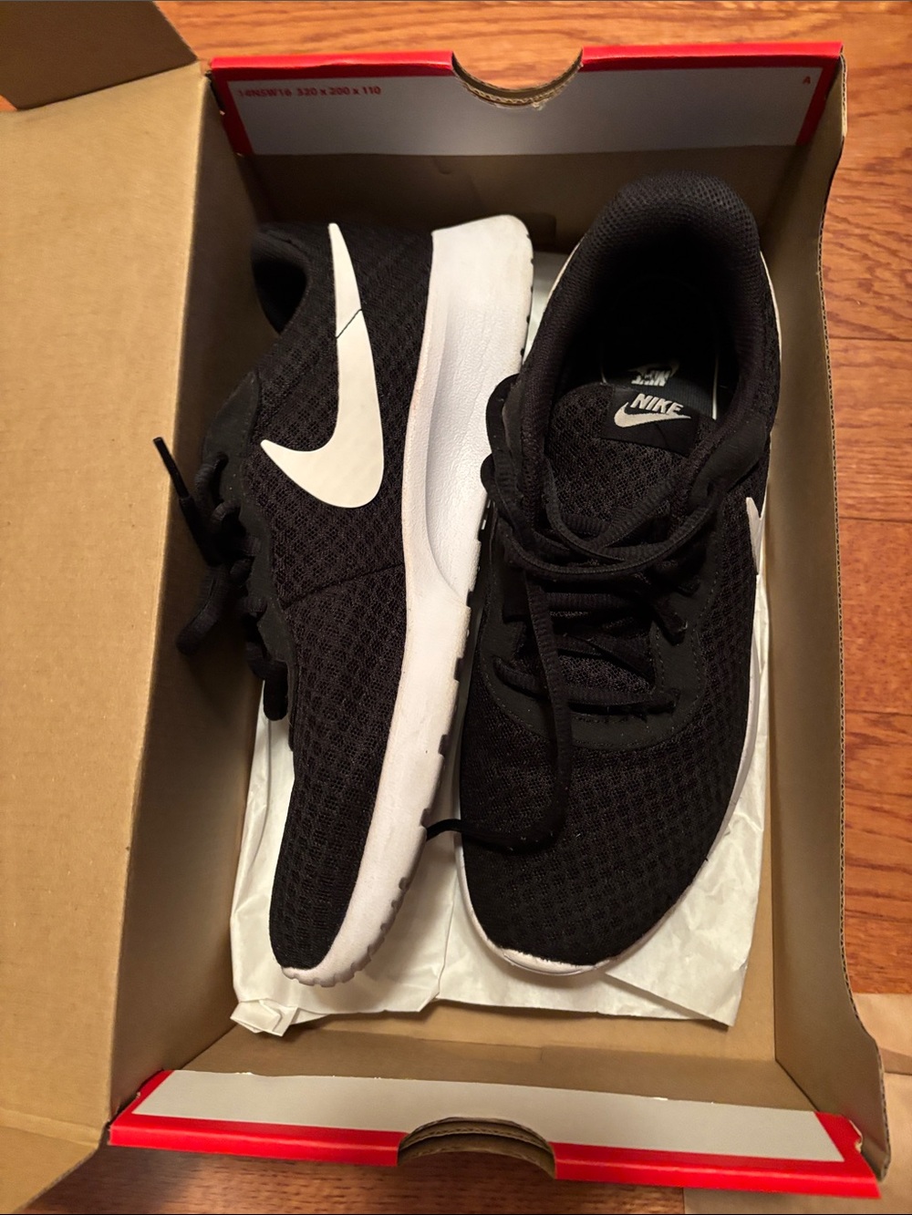 Nike Tanjun Women’s Black and White Mesh Sneakers